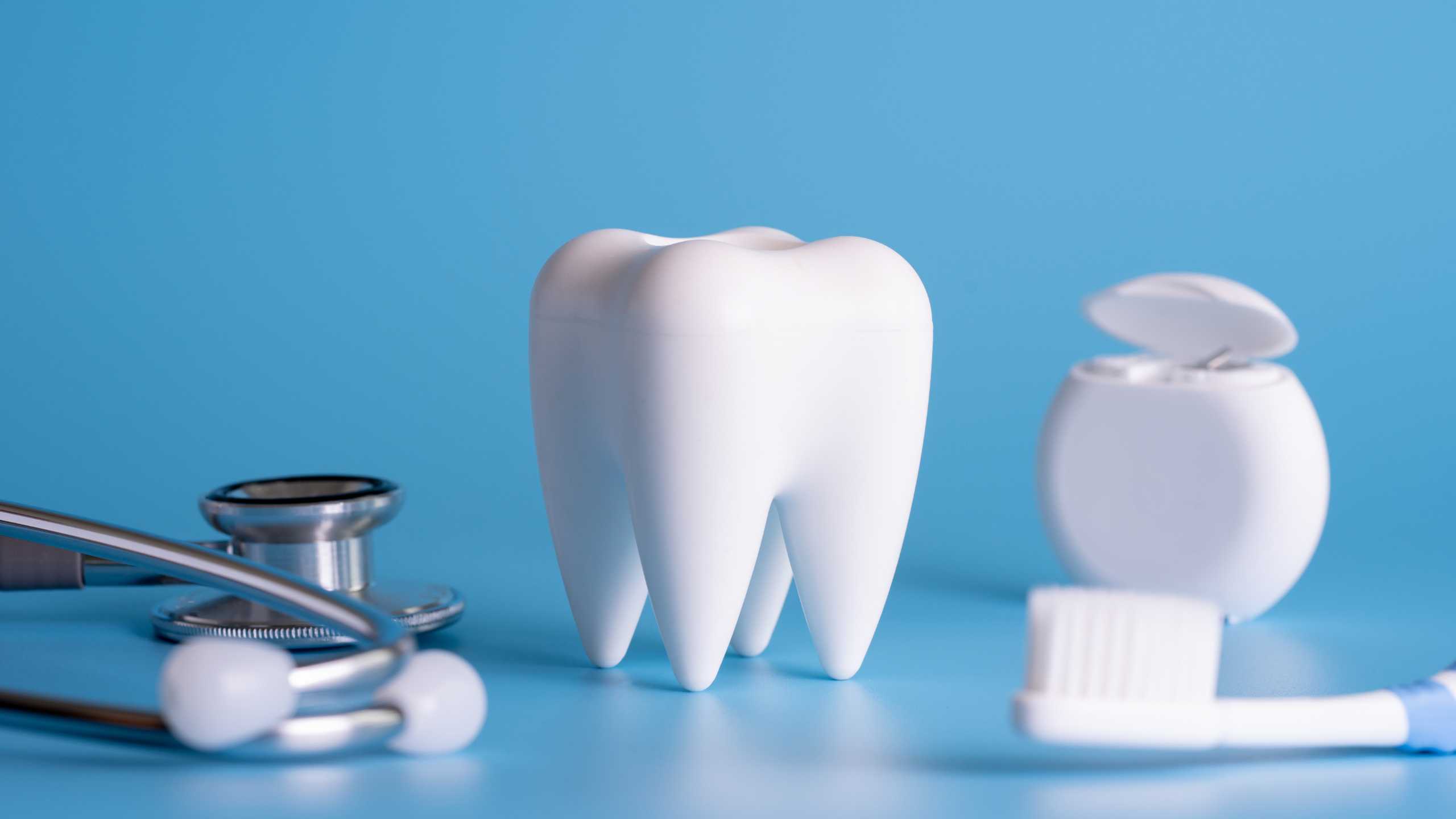 Friendly dentist with a patient